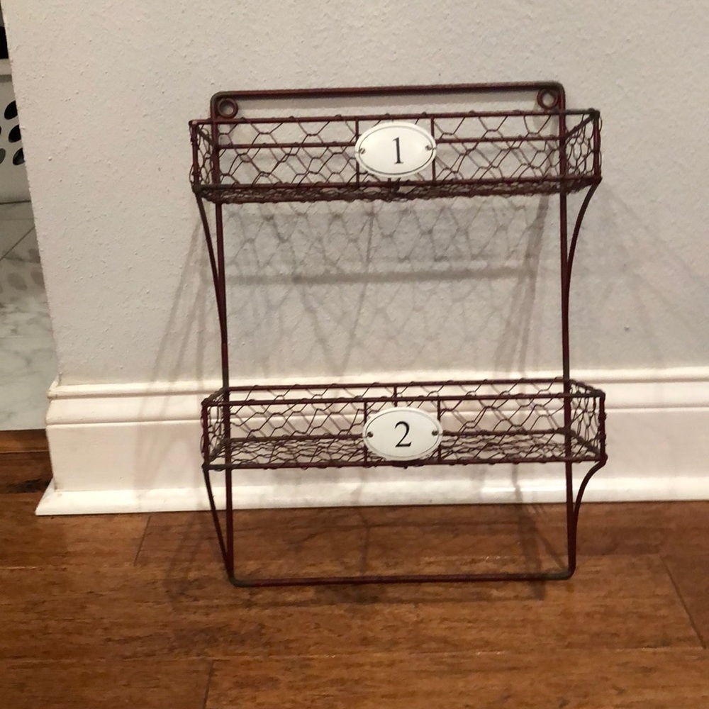 Rustic farmhouse red chicken wire shelf.